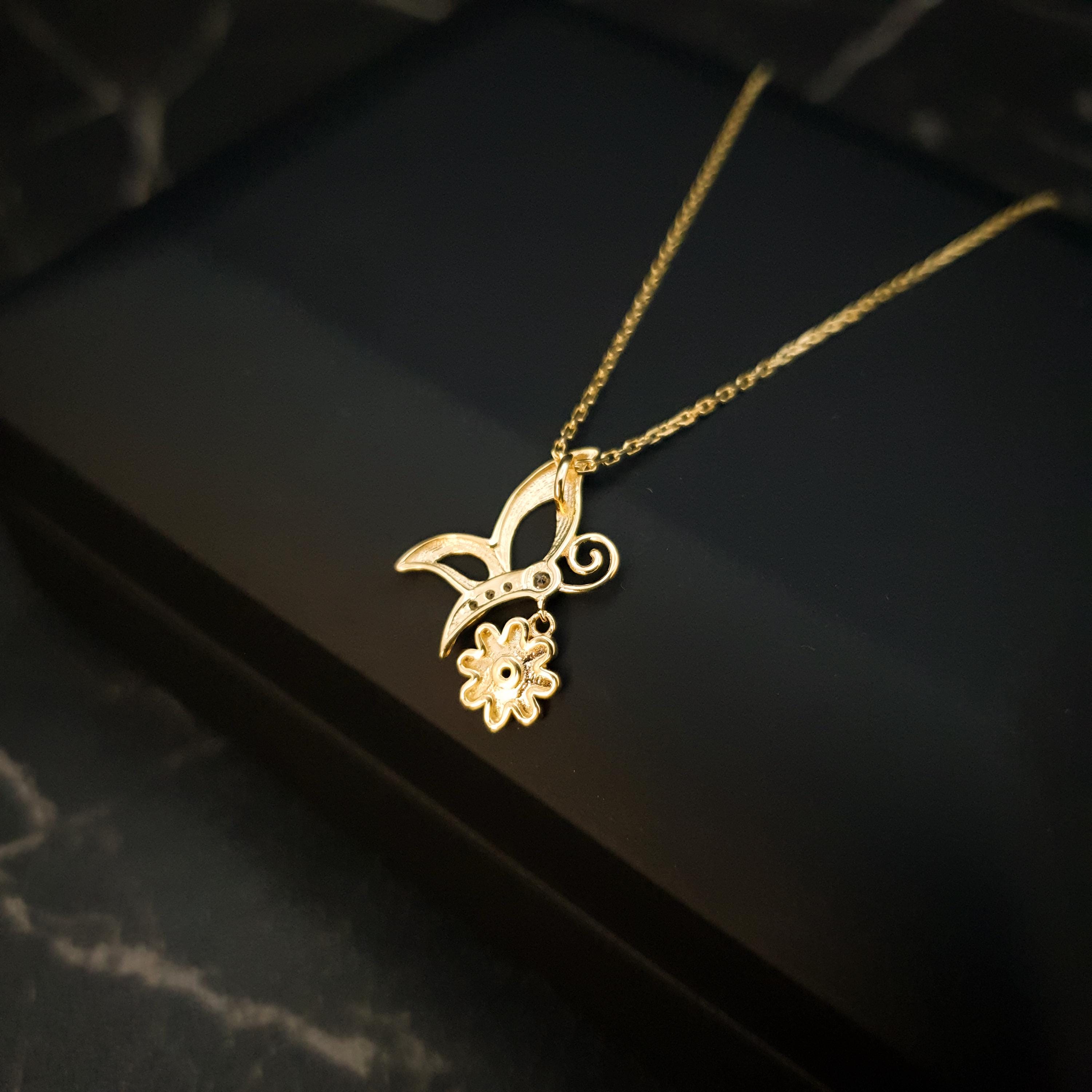 18K Gold Butterfly Necklace with Flower Accent