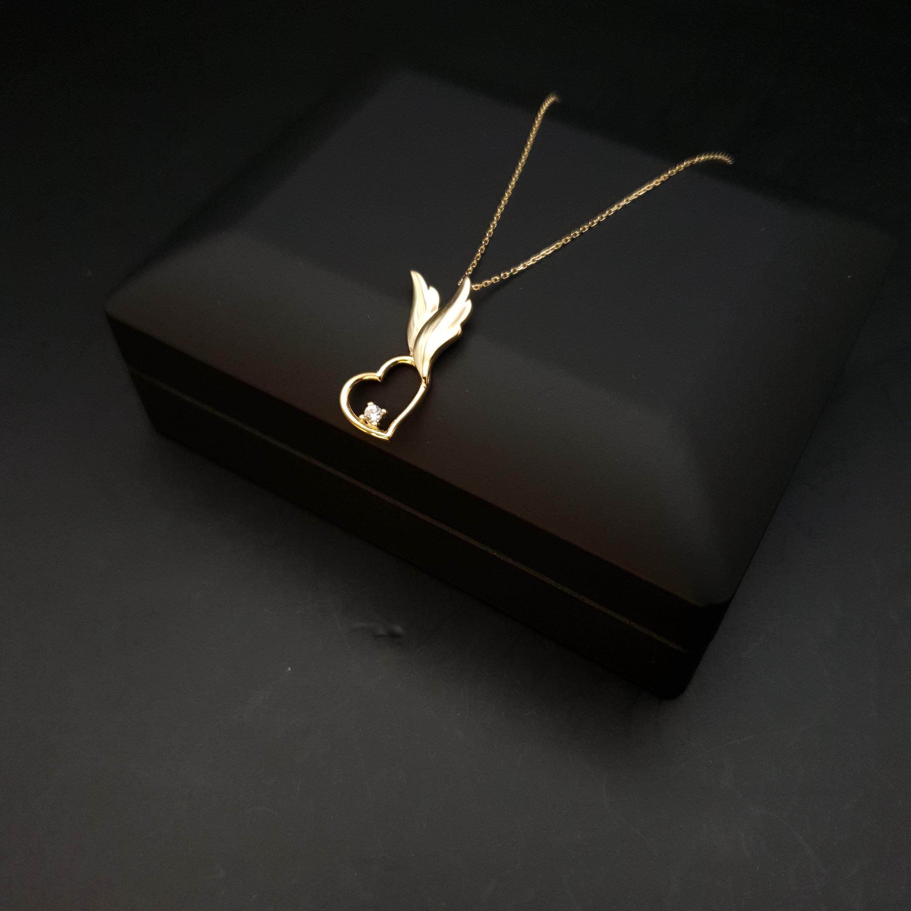 18K Gold Winged Heart Necklace with Diamond