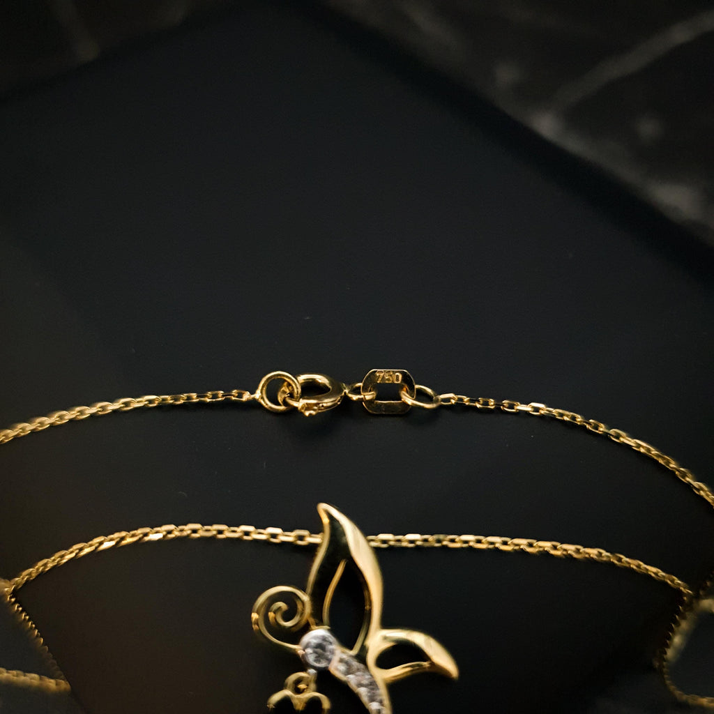 18K Gold Butterfly Necklace with Flower Accent