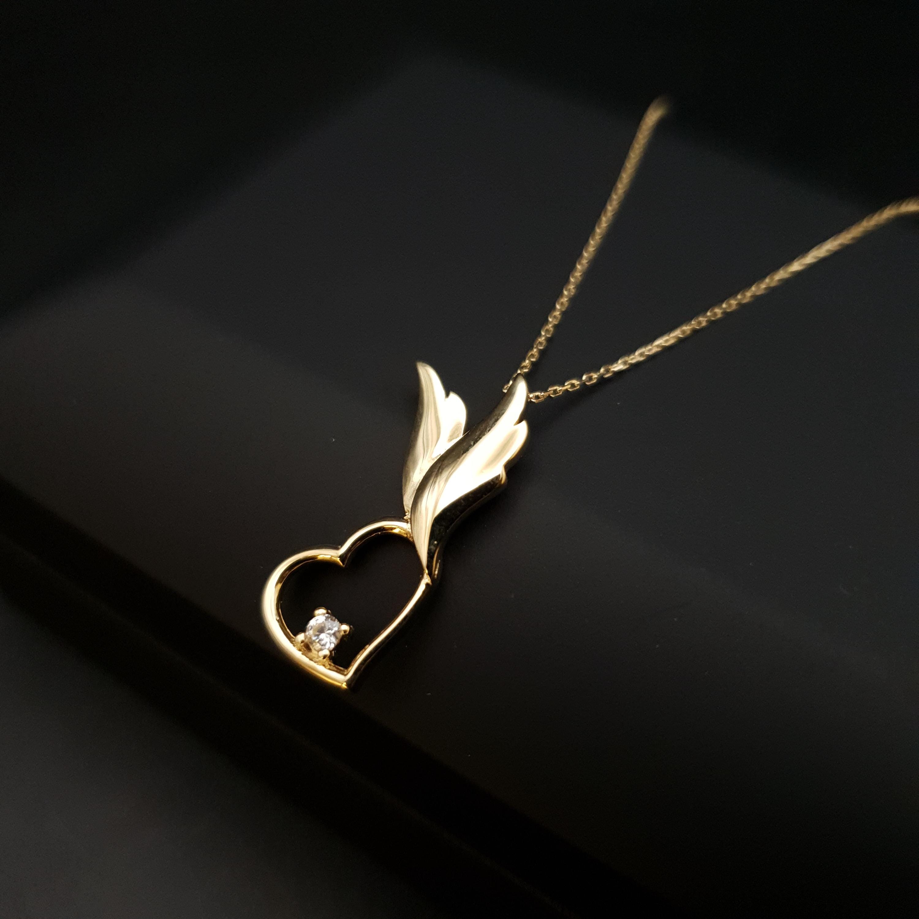 18K Gold Winged Heart Necklace with Diamond