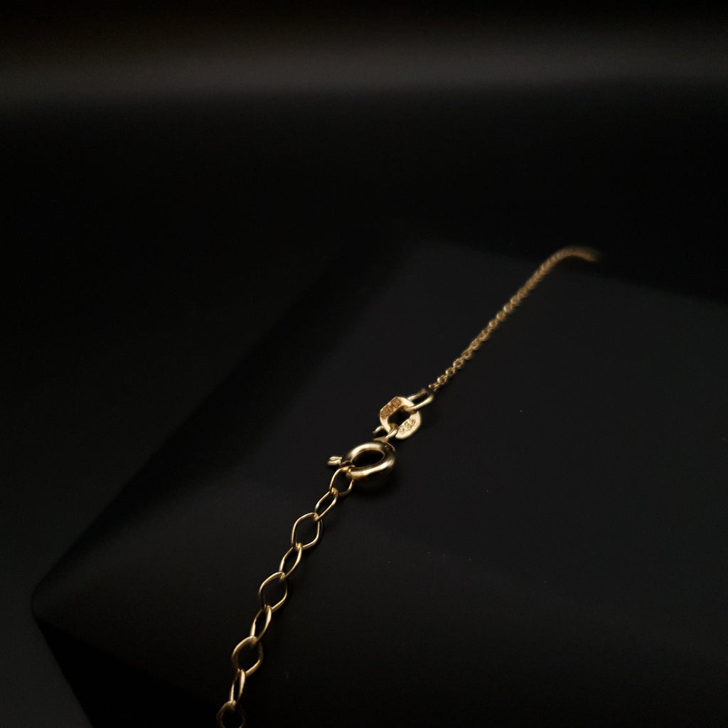 18K Gold Floral Pendant Necklace: Dark Blue Cubic Zirconia