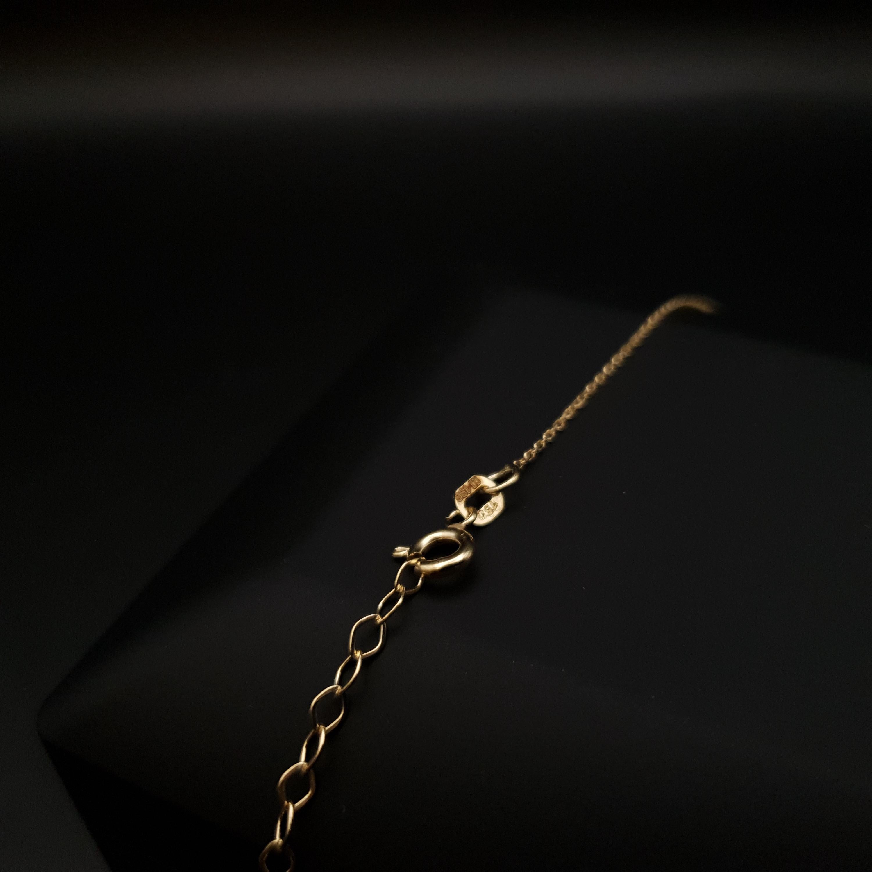 18K Gold Floral Pendant Necklace: Dark Blue Cubic Zirconia