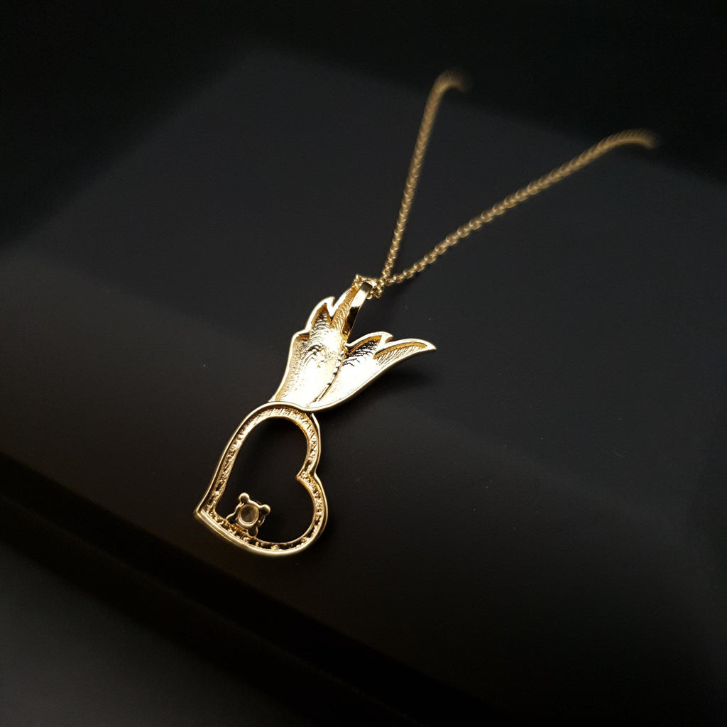 18K Gold Winged Heart Necklace with Diamond