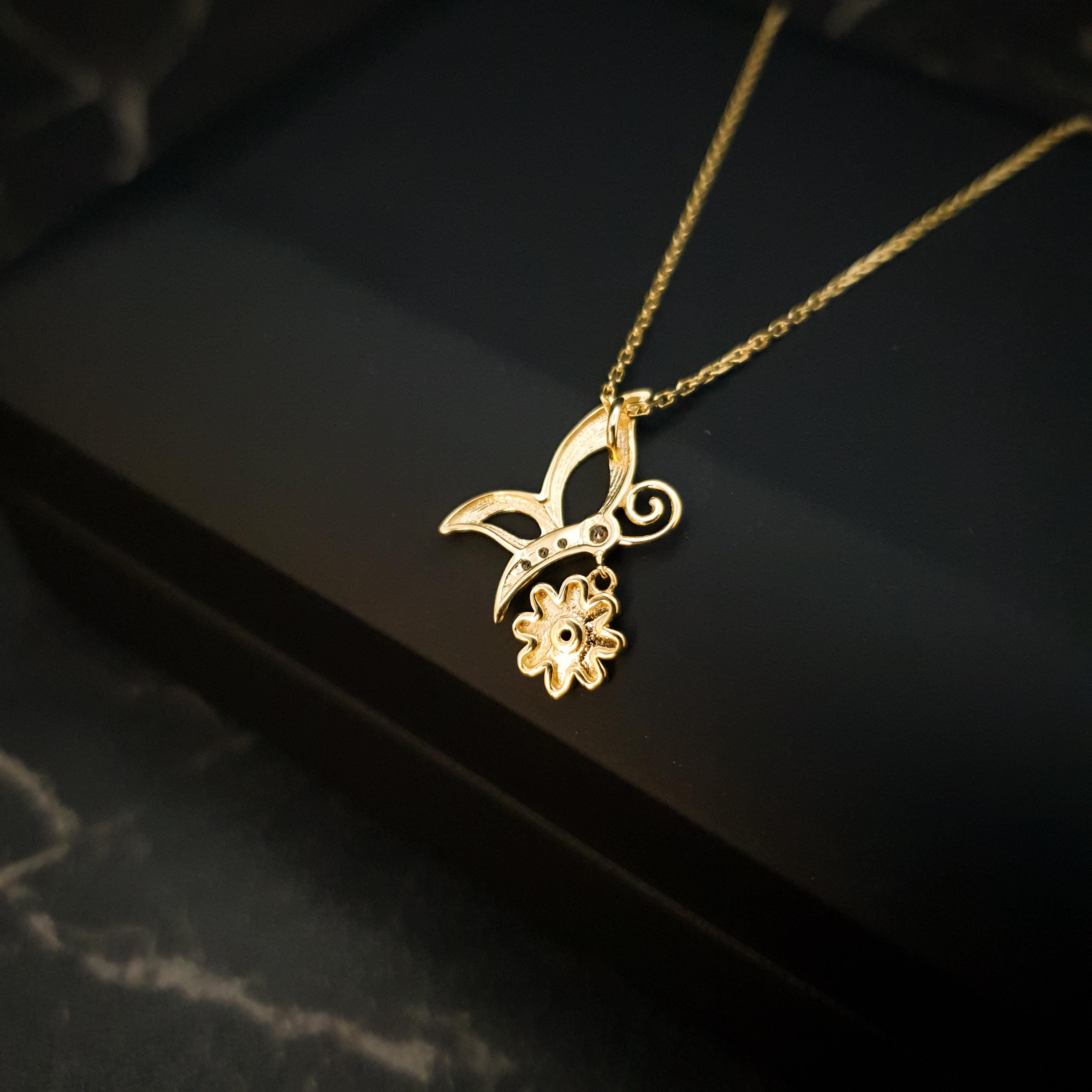 18K Gold Butterfly Necklace with Flower Accent