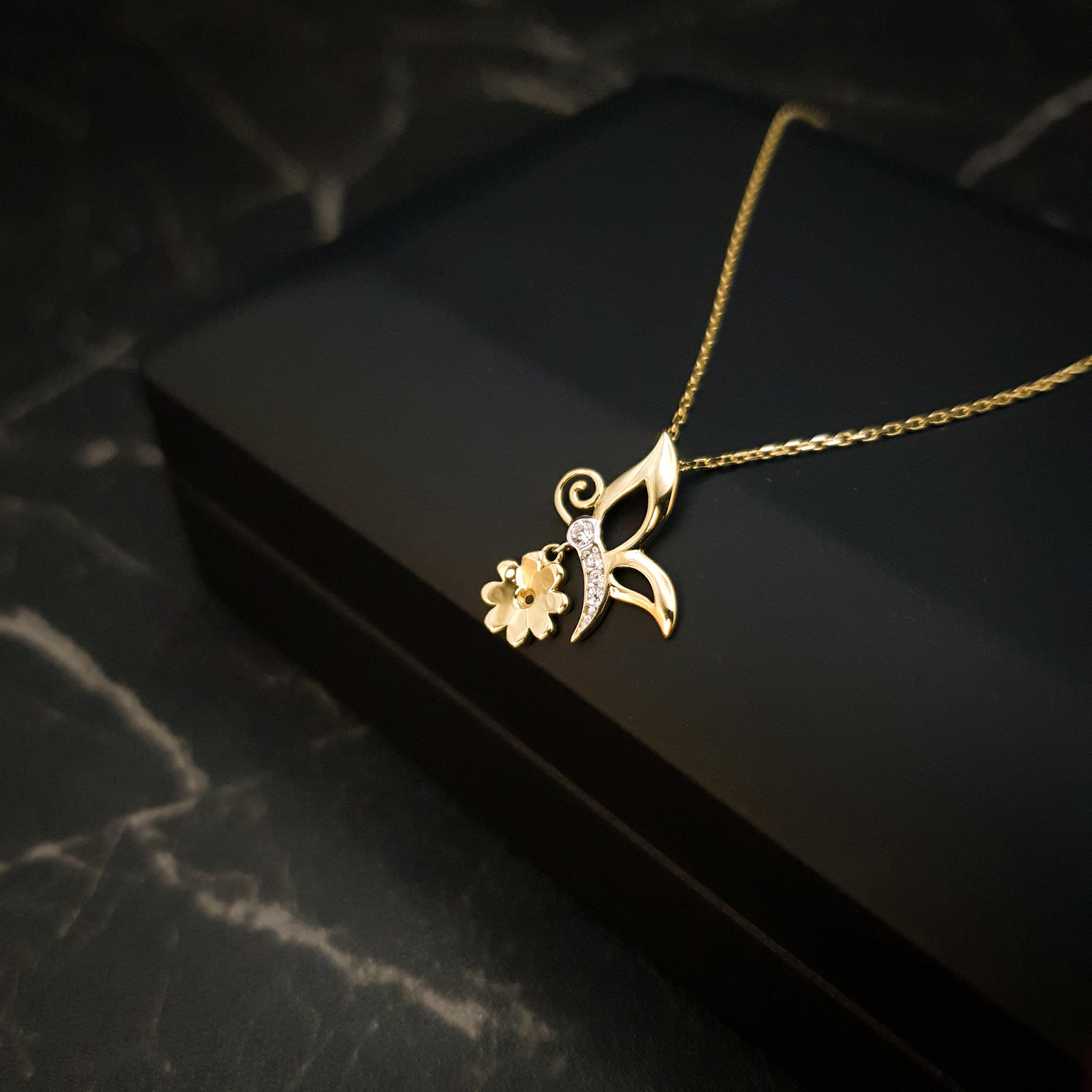 18K Gold Butterfly Necklace with Flower Accent