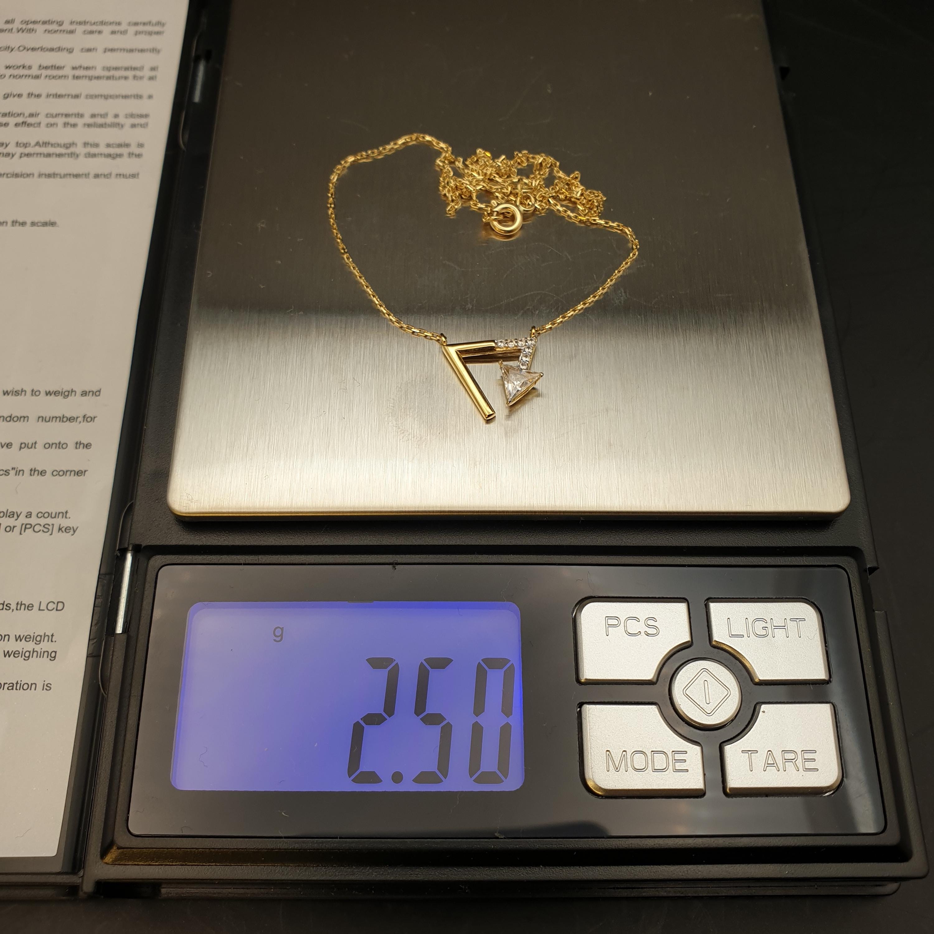 18K Gold Diamond Triangle Pendant Necklace: Geometric Charm