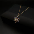 18K Gold Floral Pendant Necklace: Dark Blue Cubic Zirconia