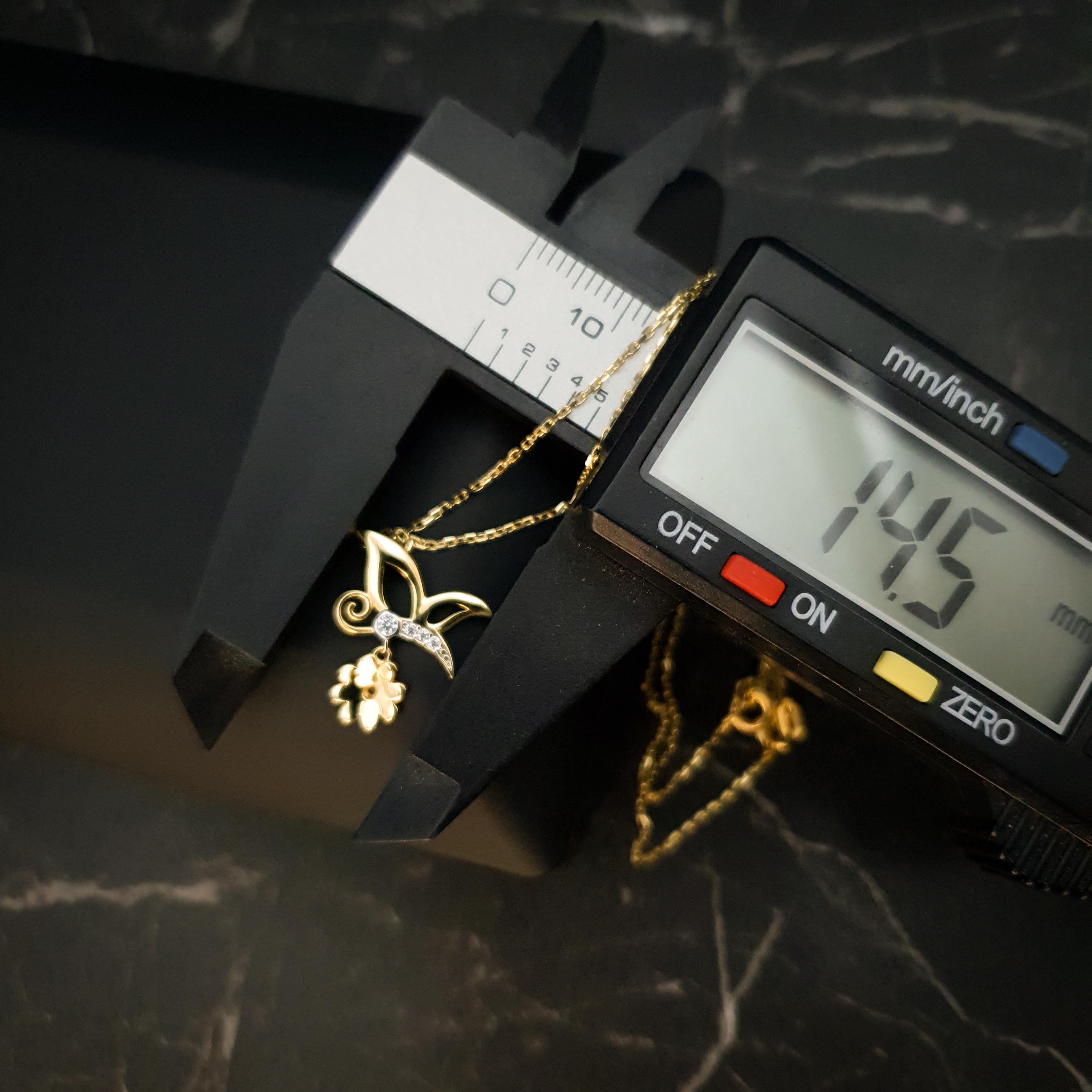 18K Gold Butterfly Necklace with Flower Accent