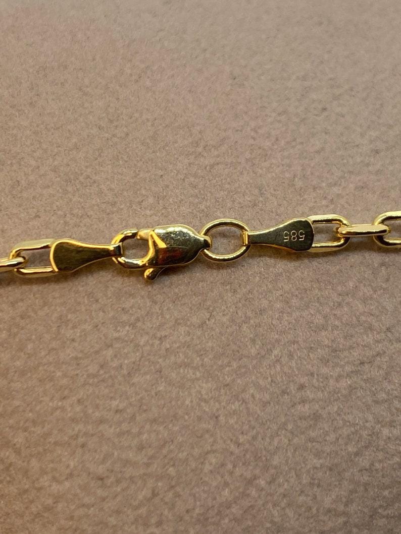 14k Gold Cross Necklace with Cable Chain: 23.5 inches, 3mm thickness